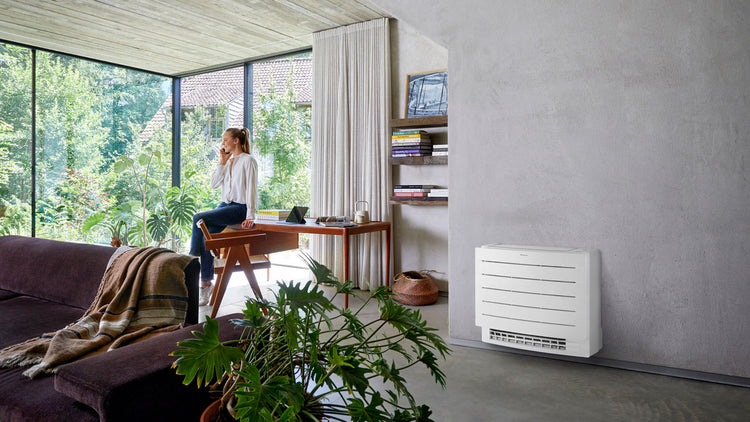 Daikin Perfera floor-standing air conditioner installed in a home office